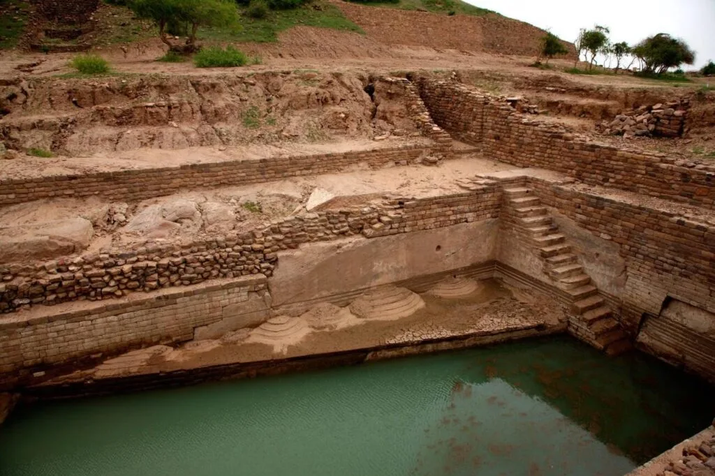 Dholavira used reservoirs and water-harvesting systems to adapt to an exceptionally dry environment.
